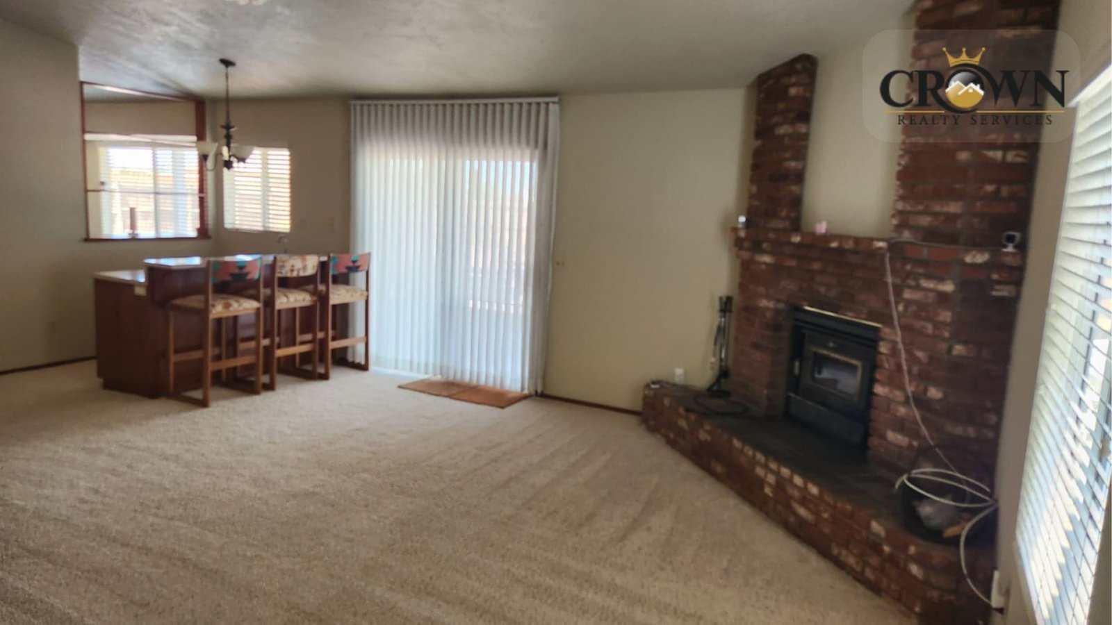 Comfortable and wide family room area inside the 3-bedroom ranch house for sale.