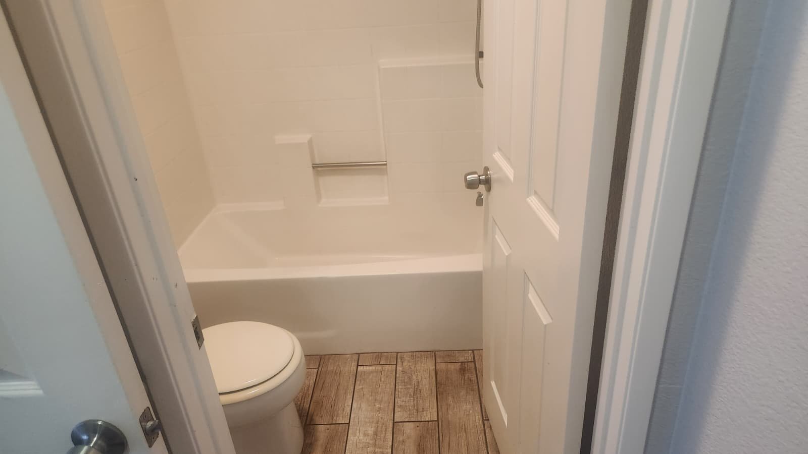 Clean and modern full bathroom in Victorville property by Crown Realty Services